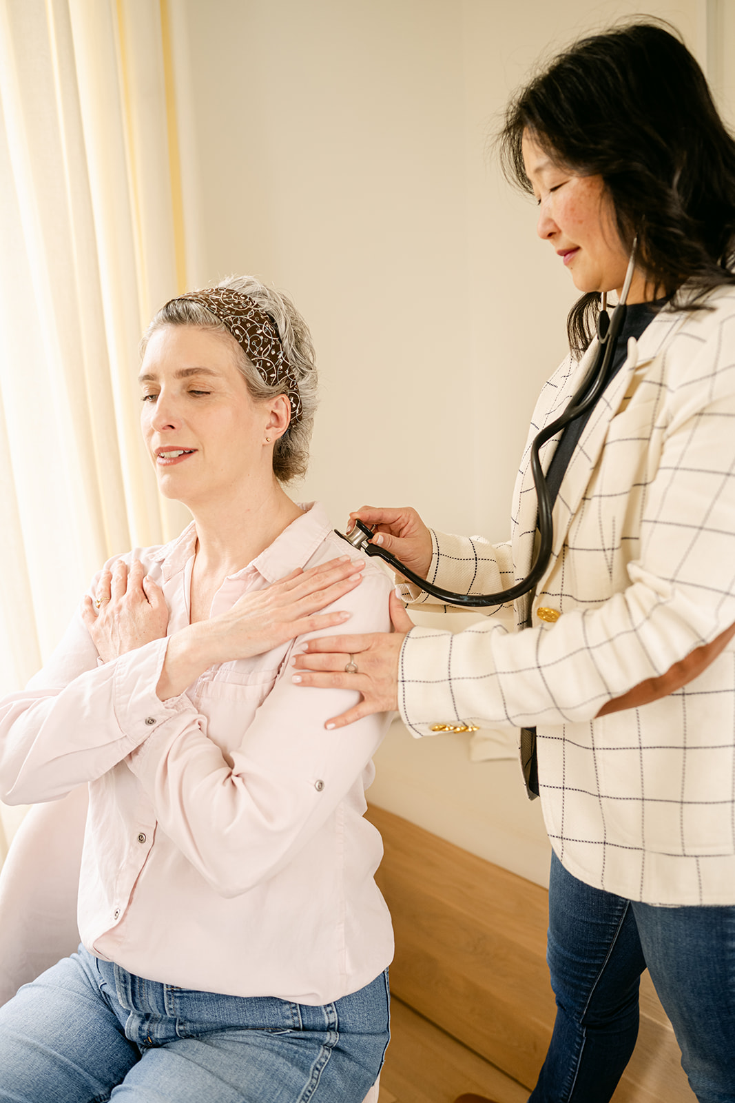 Dr. Janice Wu examining a patient